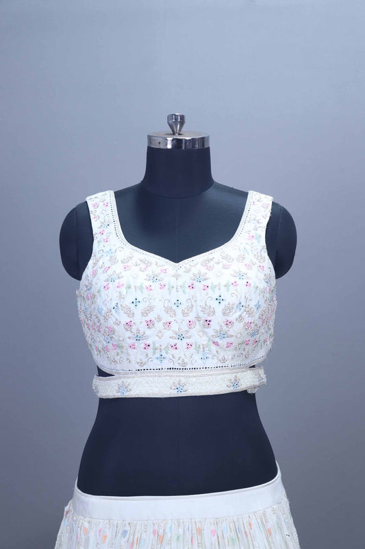 Elegant White Embroidered Lehenga Choli with Pastel Dupatta