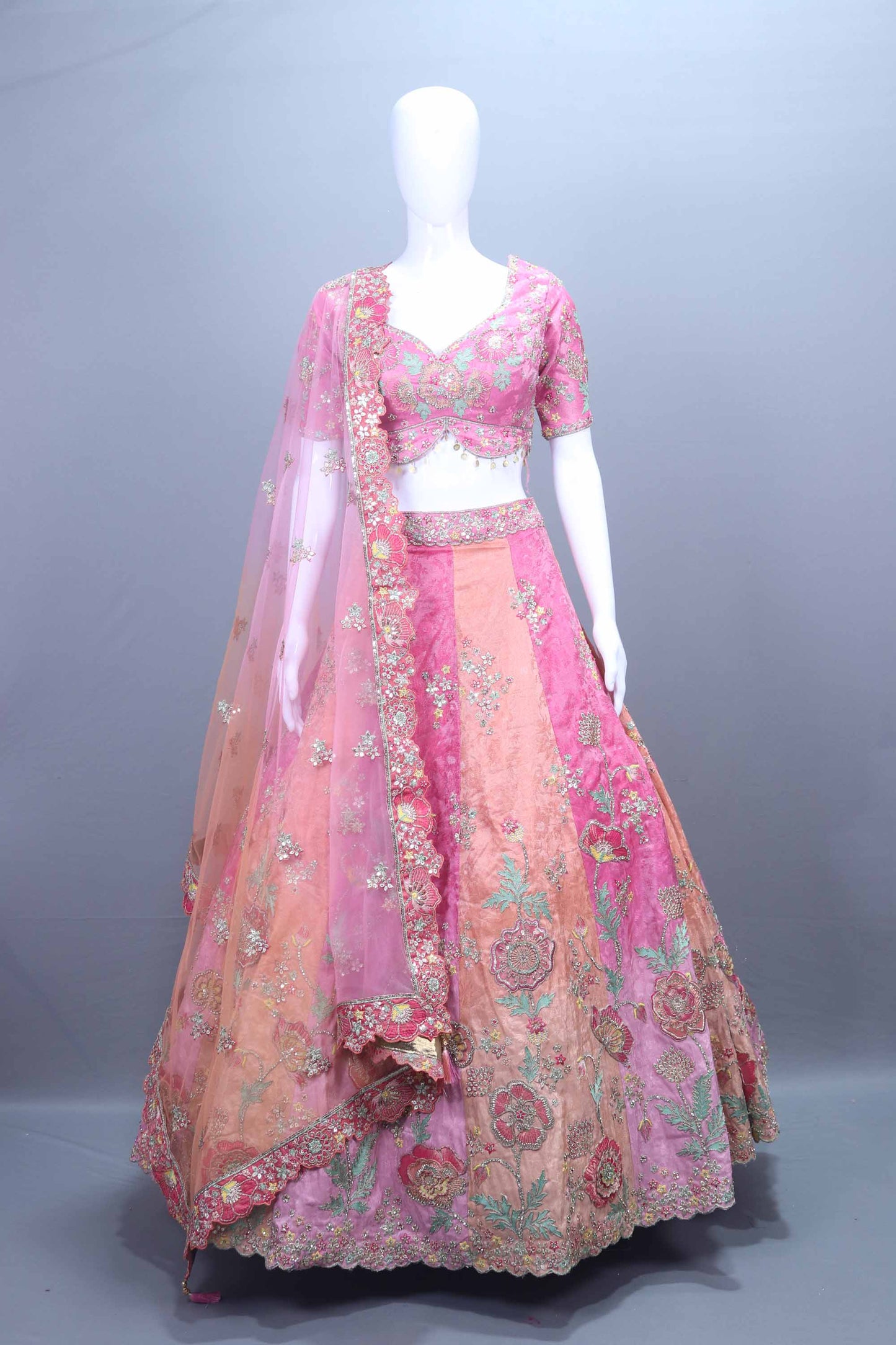 Designer Peach Pink Embroidered Velvet Lehenga Choli with Net Dupatta