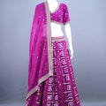 Magenta Bandhani Lehenga Choli with Heavy Gota Embroidery and Matching Dupatta