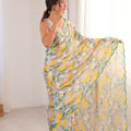 Grey Yellow Floral Printed Georgette Saree with Embellished Border