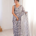 Grey Wavy Printed Georgette Saree Embellished Border Matching Blouse 