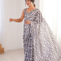Grey Wavy Printed Georgette Saree Embellished Border Matching Blouse