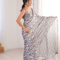 Grey Wavy Printed Georgette Saree Embellished Border Matching Blouse