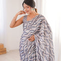 Grey Wavy Printed Georgette Saree Embellished Border Matching Blouse