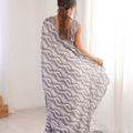 Grey Wavy Printed Georgette Saree Embellished Border Matching Blouse