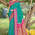 Teal Green Paithani Silk Saree with Pink Gold Zari Border 