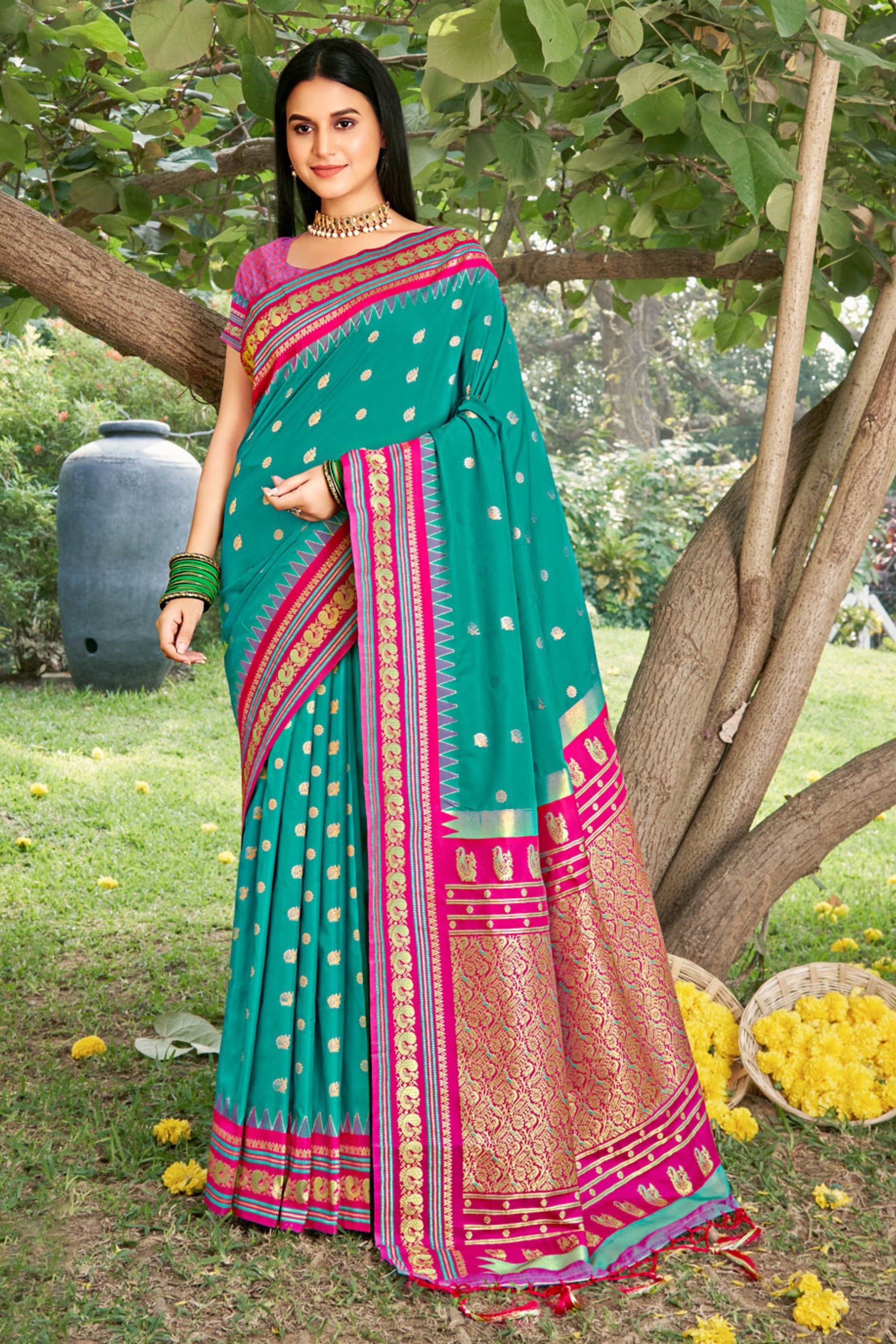 Teal Green Paithani Silk Saree with Pink Gold Zari Border 
