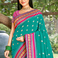 Teal Green Paithani Silk Saree with Pink Gold Zari Border