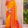 Mustard Yellow Red Ikat Silk Saree Traditional Woven Motifs Contrast Border