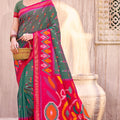 Green Magenta Ikat Silk Saree Traditional Woven Motifs Contrast Border