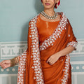 Rust Orange Organza Silk Saree with White Floral Embroidery Border