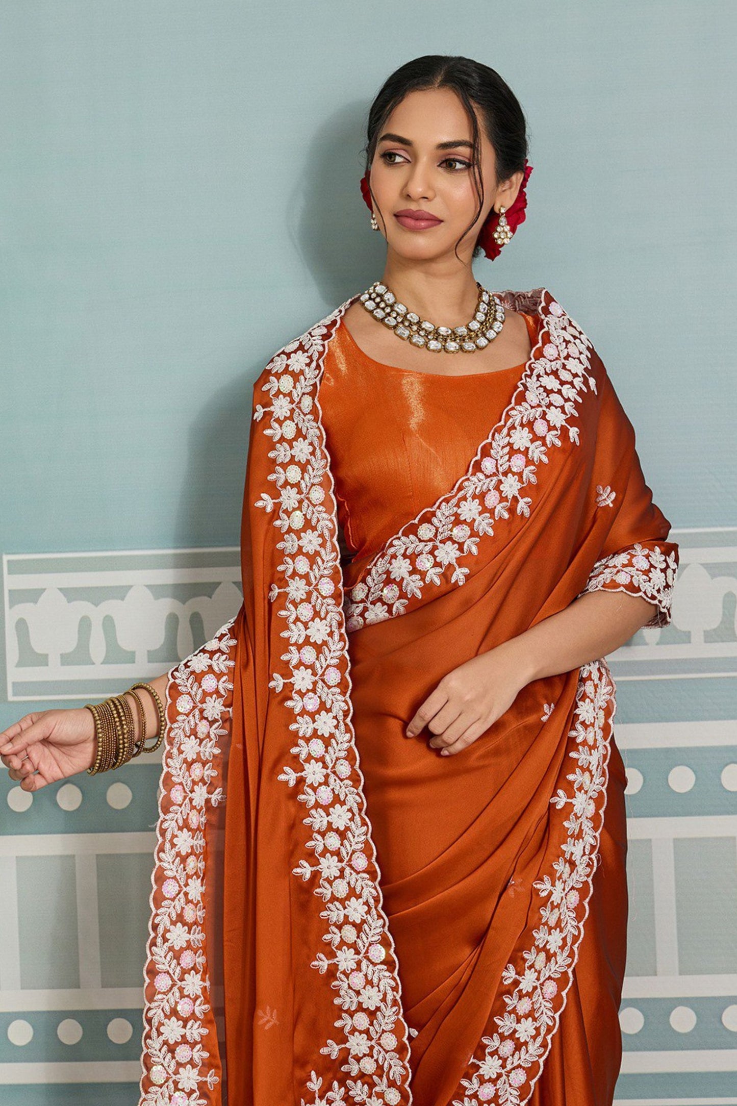 Rust Orange Organza Silk Saree with White Floral Embroidery Border