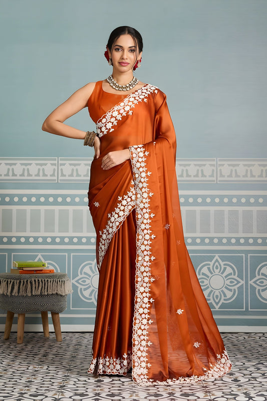 Rust Orange Organza Silk Saree with White Floral Embroidery Border