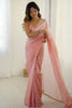Elegant Peach Organza Saree with Minimal Texture Tassel Border