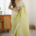  Pistachio Green Organza Saree with Soft Shaded Finish Tassel Border 