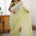 Pistachio Green Organza Saree with Soft Shaded Finish Tassel Border