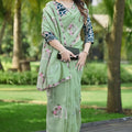 Pastel Green Organza Saree with Floral Embroidery Designer Border