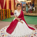 Stunning White Georgette Lehenga Choli with Elephant Motif Border and Pink Dupatta for Women