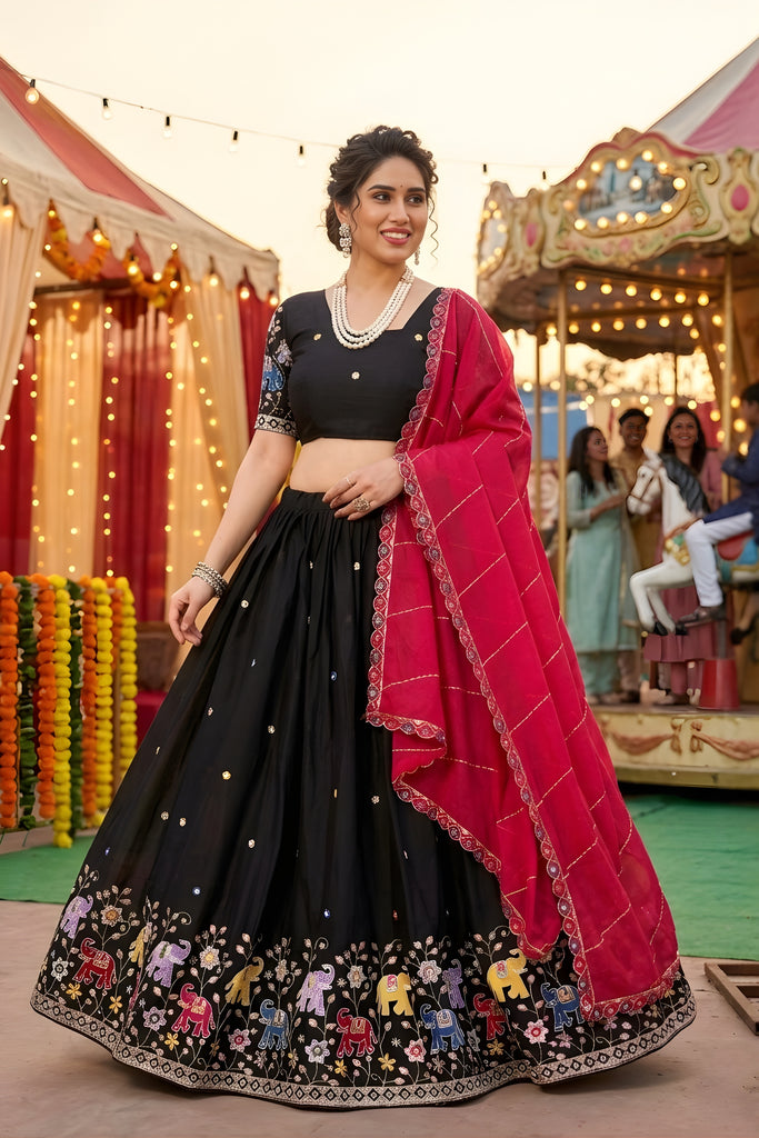Trendy Black Georgette Lehenga Choli with Elephant Motif Border and Pink Dupatta for Women