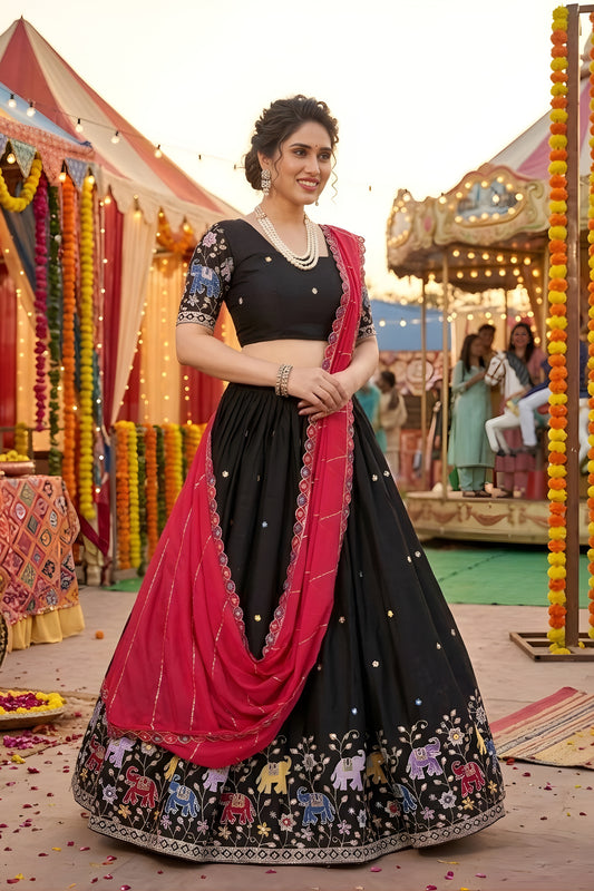 Trendy Black Georgette Lehenga Choli with Elephant Motif Border and Pink Dupatta for Women