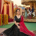 Trendy Black Georgette Lehenga Choli with Elephant Motif Border and Pink Dupatta for Women