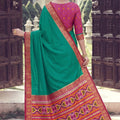 Graceful Teal Green Silk Woven Designer Saree for Women