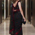 Stunning Black Soft Georgette Saree with Red Floral Embroidery and Cutwork Border for Women