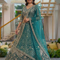 Delicate Teal Green Butterfly Net Heavy Embroidered Lehenga Choli with Dupatta for Women