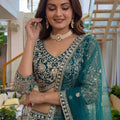 Delicate Teal Green Butterfly Net Heavy Embroidered Lehenga Choli with Dupatta for Women