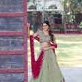 Stylish Pista Green Embroidered Georgette Lehenga Choli with Pink Dupatta for Women