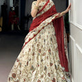 Festive Off White Foil Printed Tassar Silk Lehenga Choli with Maroon Dupatta for Women