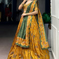 Admiring Mustard Yellow Foil Printed Tassar Silk Lehenga Choli with Green Dupatta for Women