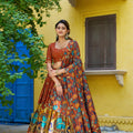 Elegant Rust Orange Kalamkari Printed Lehenga Choli Elephant Motif Border Dupatta