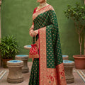 Graceful Dark Green Soft Silk Saree with Zari Weaving for Women