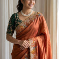 Gracefull Orange Rangoli Silk Saree Embroidered Border for Wedding