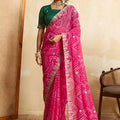 Graceful Rani Pink Georgette Bandhani Printed Saree Heavy Border for Wedding