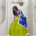 Graceful Lime Green Cotton Navratri Lehenga Choli with Royal Blue Lace Work Dupatta