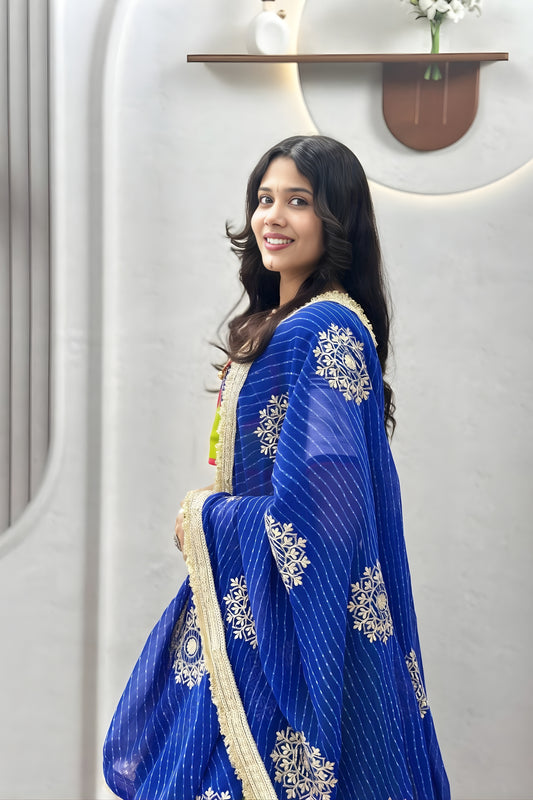 Graceful Lime Green Cotton Navratri Lehenga Choli with Royal Blue Lace Work Dupatta