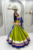 Graceful Lime Green Cotton Navratri Lehenga Choli with Royal Blue Lace Work Dupatta