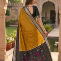 Stylish Mustard Yellow Ikkat Silk Blend Saree Woven Work for Women