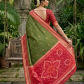 Graceful Olive Green Ikkat Silk Blend Saree Woven Work for Women