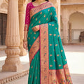 Graceful Teal Green Paithani Silk Rich Zari Weaving Saree for Women