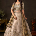 Regal Beige Fendy Silk Designer Lehenga Choli with Heavy Gold Embroidery and Zari Work Dupatta