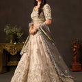 Regal Beige Fendy Silk Designer Lehenga Choli with Heavy Gold Embroidery and Zari Work Dupatta