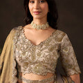 Regal Beige Fendy Silk Designer Lehenga Choli with Heavy Gold Embroidery and Zari Work Dupatta