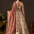 Exquisite Beige Fendy Silk Designer Lehenga Choli with Heavy Gold Embroidery and Dupatta