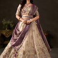 Enchanting Beige Fendy Silk Designer Lehenga Choli with Heavy Gold Embroidery and Dupatta