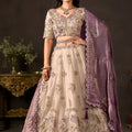 Enchanting Beige Fendy Silk Designer Lehenga Choli with Heavy Gold Embroidery and Dupatta