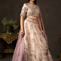 Enchanting Beige Fendy Silk Designer Lehenga Choli with Heavy Gold Embroidery and Dupatta