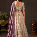 Enchanting Beige Fendy Silk Designer Lehenga Choli with Heavy Gold Embroidery and Dupatta
